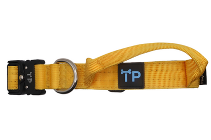 Yellow heavy-duty dog collar with a built-in handle, metal D-ring, and black buckle featuring the TP logo.
